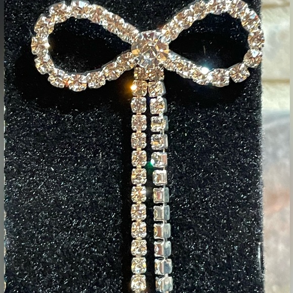 NWT bow rhinestone post earrings with two sets of backings. - Picture 2 of 4